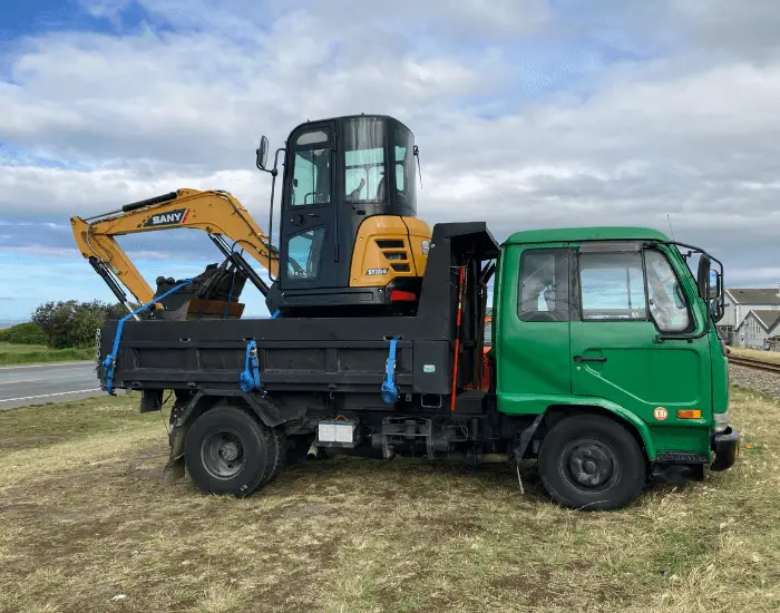 Tipper truck and digger for cartage and aggregate supply